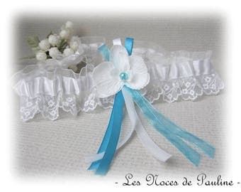 Has white and turquoise lace wedding garter