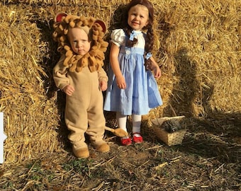 Dorothy or Cowardly Lion from the Wizard of Oz.