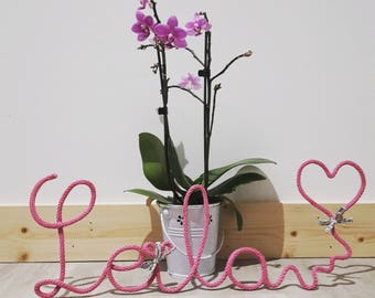 Knitting with puffed heart shaped initials