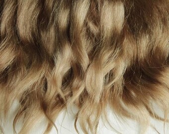 Premium mohair for doll hair.