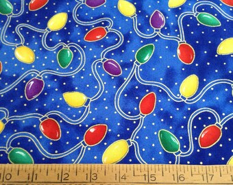 Christmas lights on blue background cotton fabric by the yard