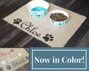 Custom colored puppy dog pet placemat for dog food bowls - personalized with your pets name between the paws! Now with a rainbow of colors