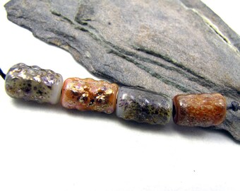 Bumpty Tubes - Shiny Textured Glass Lampwork Tubes Pastel Peachy Carnelian Orange & Opalescent Ecru with Metallic Earthy Speckles set of 4
