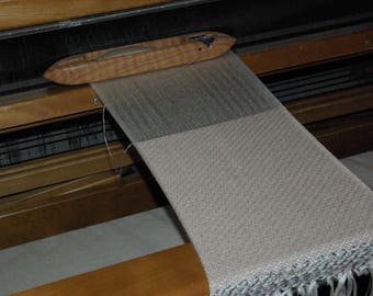 Scarf handwoven on loom on arm