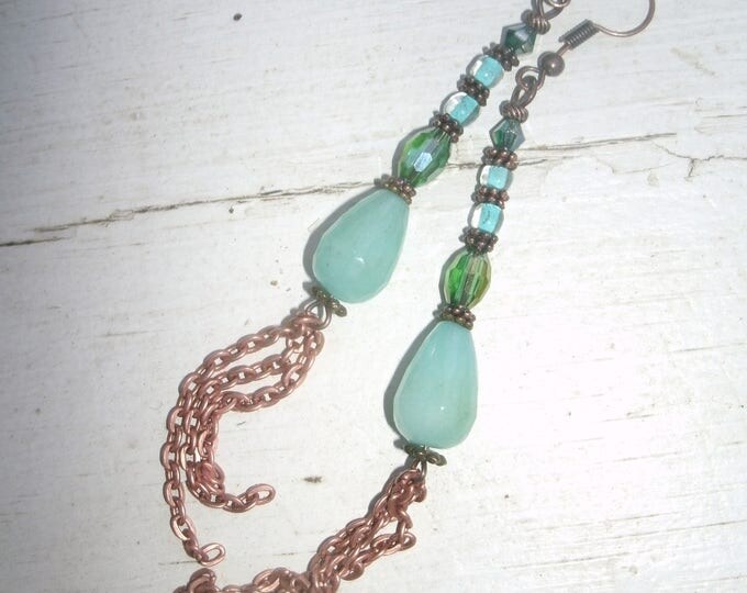 Boho Earrings, a little random, a little classy and a lot one of a kind! Blues , greens and copper and bronze with chain fringe bottoms
