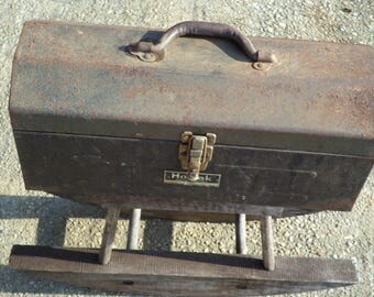 Rusty Homak gray tool box