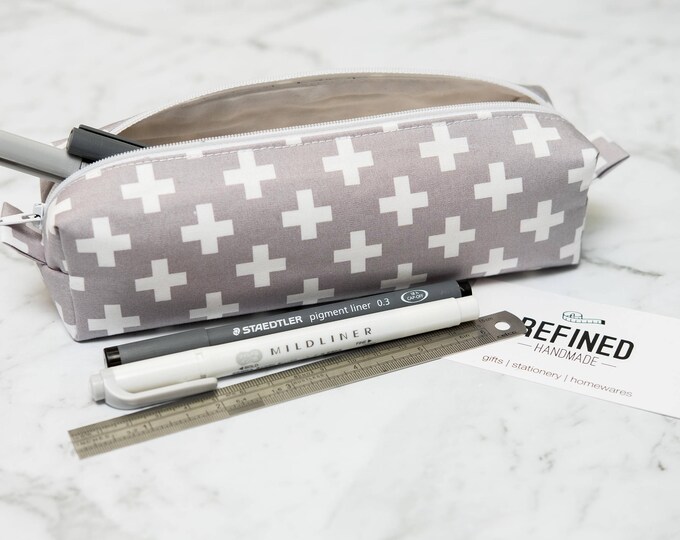 Grey and white cross pencil case