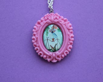 Disney's Haunted Mansion Daisy De La Cruz Cameo Necklace in Pink Resin Setting