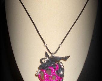 heliotrope (bloodstone) housed in cage purse gemstone