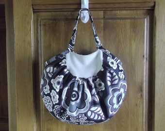 Reversible handbag with yokes and gathers.