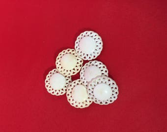 White lacy vintage buttons