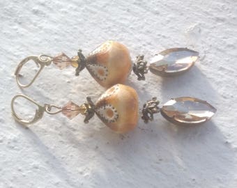 Earrings: Ceramic and champagne rhinestones