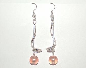 These earrings spiral pink beads