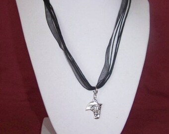 Silver horse head pendant