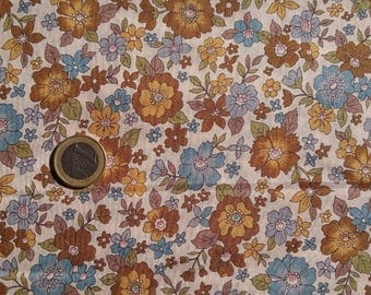 mustard-colored ruffled fabric large blue Brown flowers