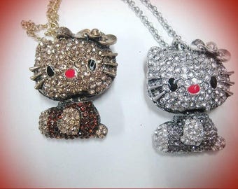 Articulated cat rhinestone pendant "bronze"