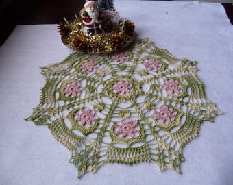 Handmade ombre green cotton and dusty rose lace doily.