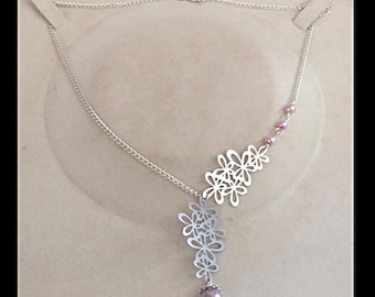Necklace prints filigree flowers and glass beads