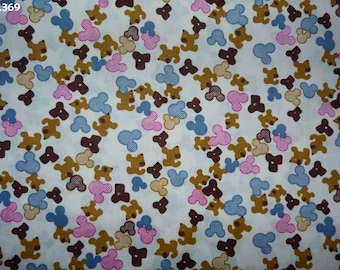 Coupon 35x50cm mickey heads and fabric C369 small dogs