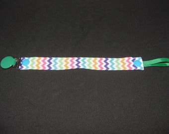 Pacifier zig-zags multicolored mixed, green clip