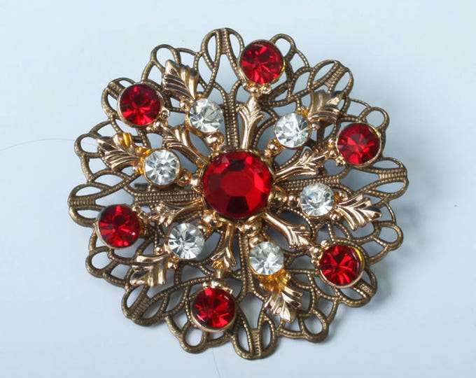 Red and Clear Rhinestone Filigree Brooch Gold Tone Atomic Style Vintage