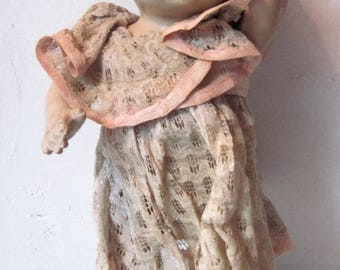 Antique Vintage composition baby Doll with delicate lace dress