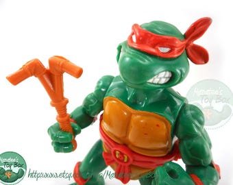 Vintage TMNT Action Figure: Michelangelo with Storage Shell 1990s
