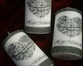 Unscented white Islamic hajj mubarak candle. Safe to burn candles with black and silver mesh embellishments