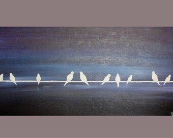 White birds on wire