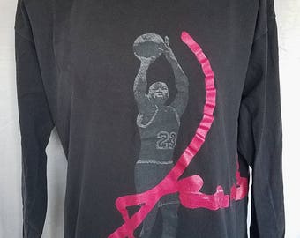 pink and gray jordan shirt