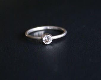 handmade: engagement ring satin, 4 mm white Topaz (925)