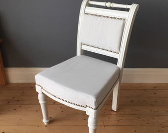 Beautiful Refurbished and re-upolstered vintage hand carved wooden chair