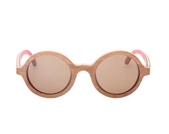 Super cool round multilayered wood sunglasses hand made in Italy, new and unworn