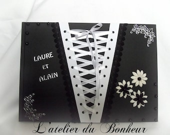 large guestbook Gothic black and white with its laced corset way
