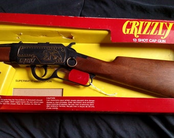 Rare vintage 1970'sEdison Toys Supermatic Grizzly 13 shot Toy Cap gun New old stock in original package made in Italy Old West Cowboy gun