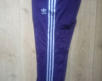 blue adidas tracksuit womens