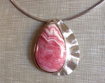 Sterling Silver and rhodochrosite.