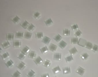 318 square mosaic tesserae, molten glass, translucent pale green