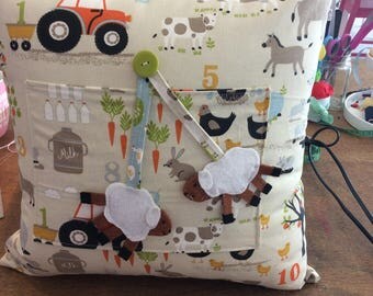 Farmyard Animals Cushion with a Pocket.