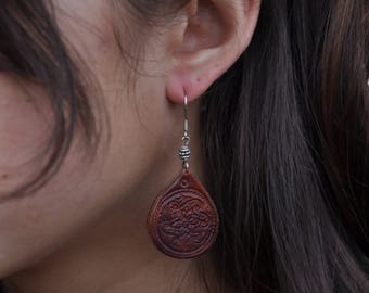 Brown tooled leather earring