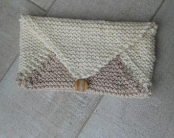 Knitted beige ecru wool clutch