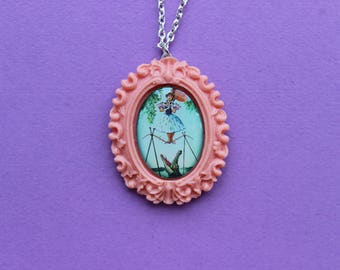 Disney's Haunted Mansion Daisy De La Cruz Cameo Necklace in Pink Resin Setting