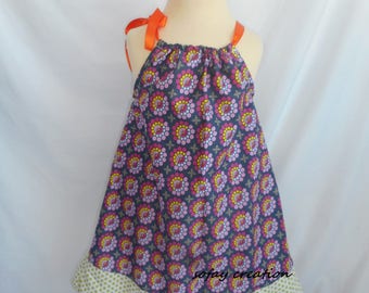 short summer dress has multi color polka dots