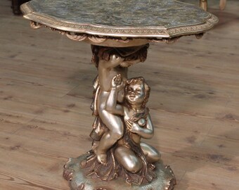 Painted side table with little angels sculpture