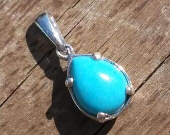 Natural Arizona sleeping beauty turquoise pendant in silver