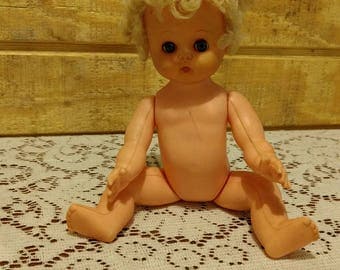 Vintage 1950s / 1960s 10" Jolly Toys plastic jointed Doll blue sleep eyes, rubber head, rooted blonde hair