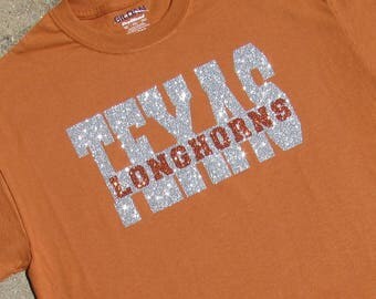 University of Texas Longhorns Glitzy Bling Short Sleeve Spirit T-Shirt with Silver and Orange High Sparkle Glitter on a Texas Orange Shirt