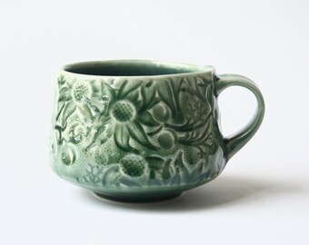 Cup with Australian Flannel Flower design - Deep green stoneware ceramic cup