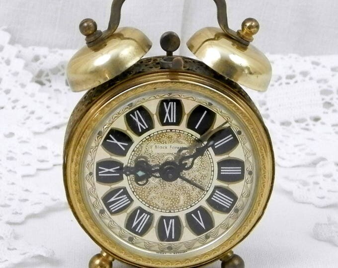 Small Working Vintage West German 1960s Metal Mechanical Wind Up Alarm Clock with Roman Numerals and Filigree Decoration, Mid Century Small Working Vintage West German 1960s Metal Mechanical Wind Up Alarm Clock with Roman Numerals and Filigree Decoration, Mid Century