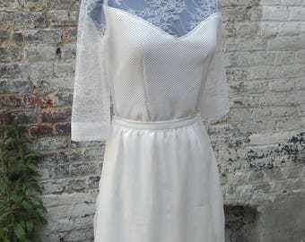 Pleated skirt and strapless wedding dress